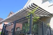 a folding awning over a balcony