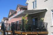 a folding awning over a balcony