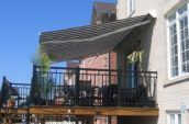a folding awning over a balcony